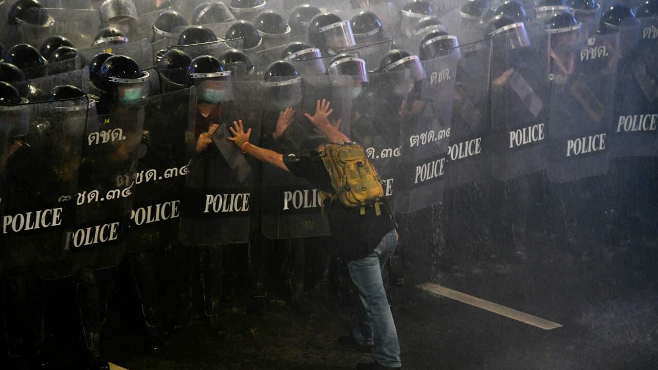 Police use water cannons to disperse pro-democracy protesters in Bangkok.