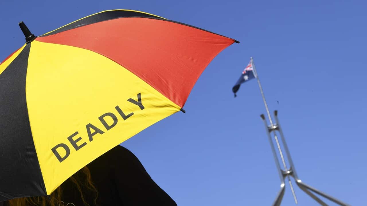 An umbrella at parliament house in Canberra (AAP).