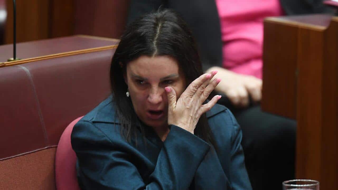Tasmanian Senator Jacqui Lambie delivers a statement on her resignation in the Senate chamber at Parliament House in Canberra.