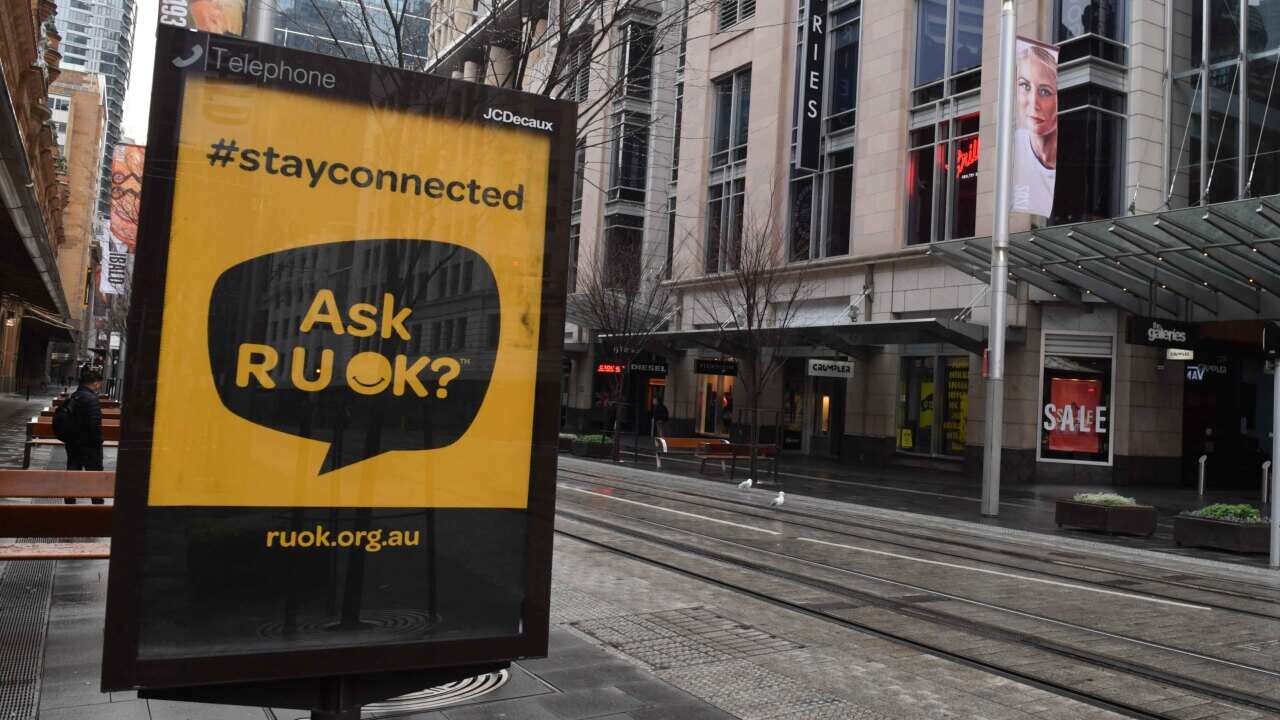 A RUOK sign on George Street is seen in the central business district in Sydney