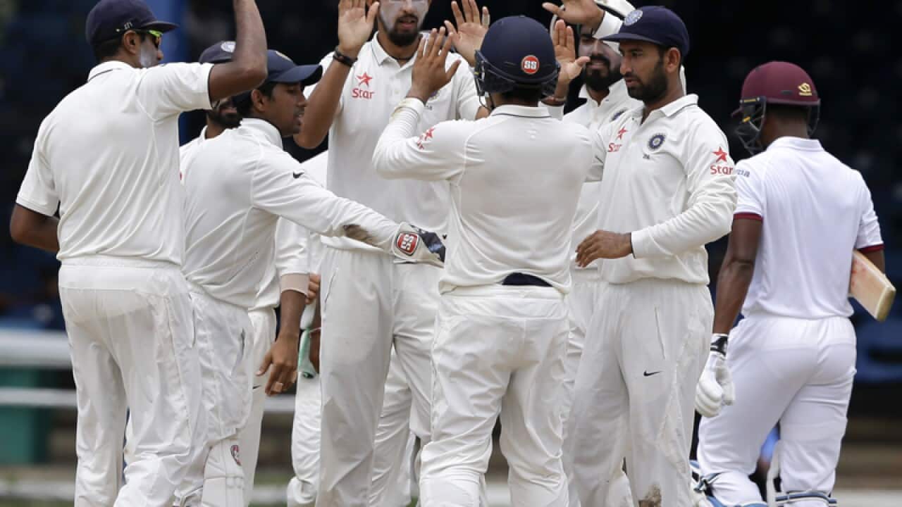 Indian bowler Ishant Sharma (C) celebrates after claiming a wicket