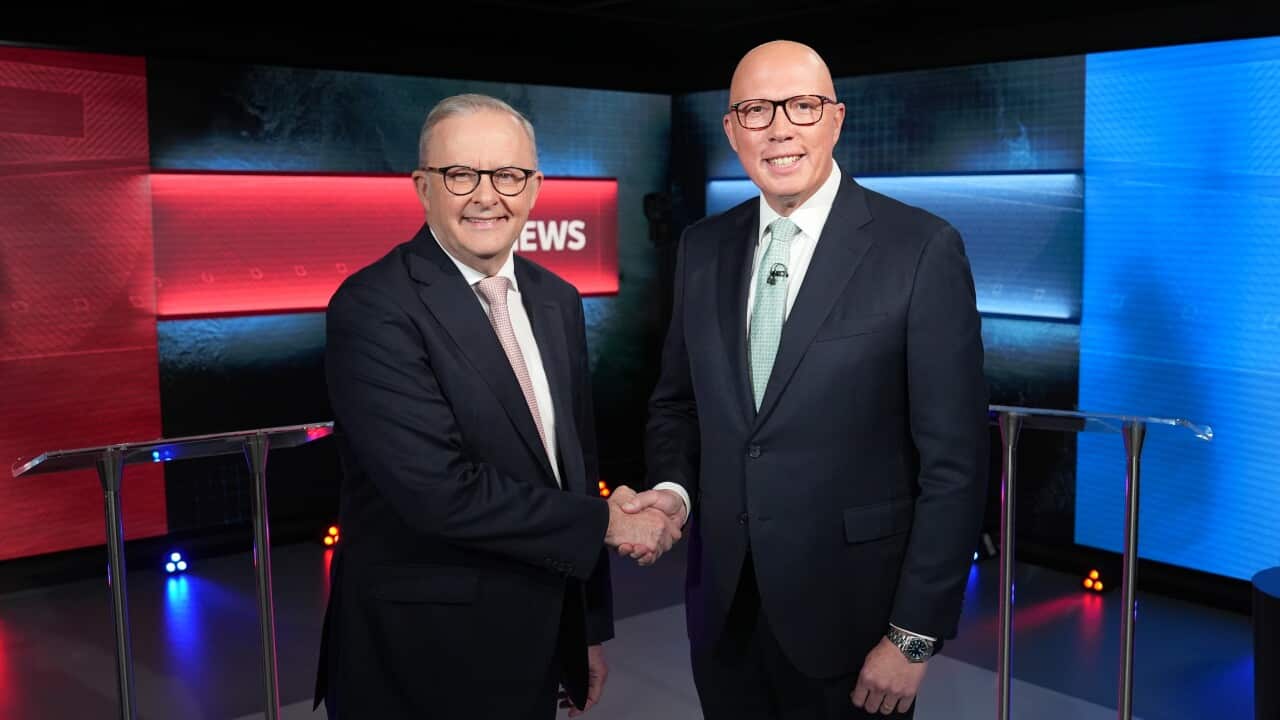 Anthony Albanese and Peter Dutton shake hands.