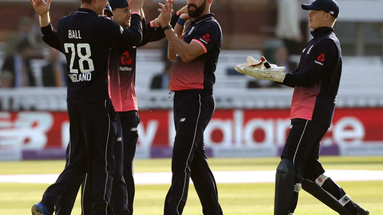 England's Liam Plunkett is congratulated by teammates