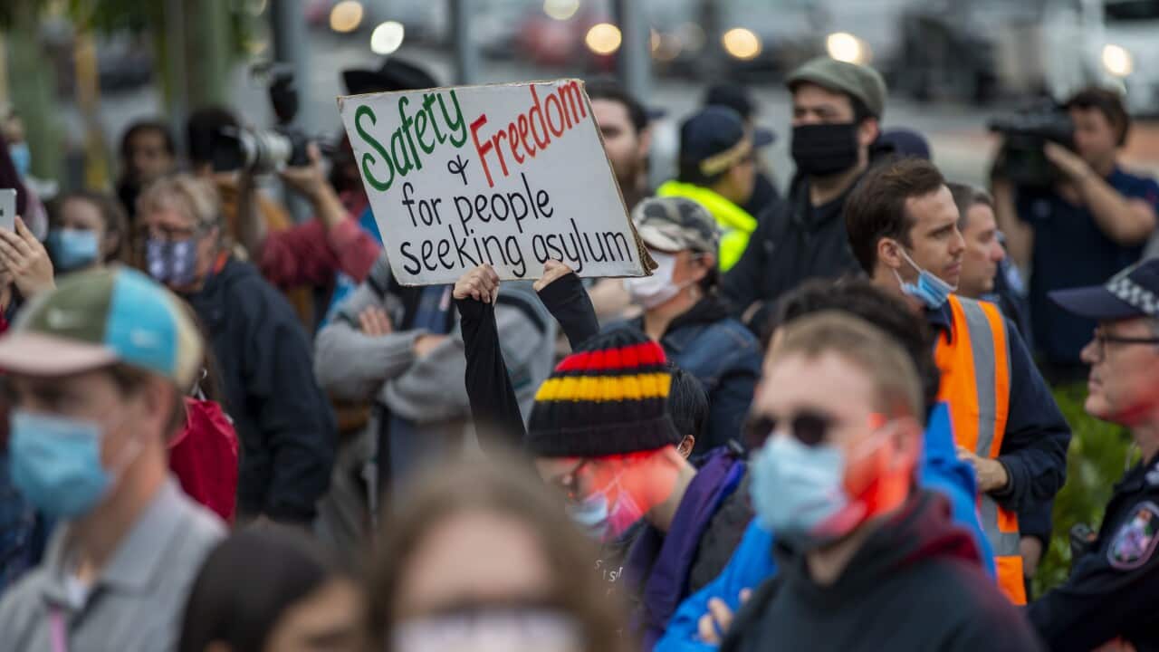 Protesters gather to support asylum seekers detained at the Kangaroo Point Central Hotel in Brisbane, Sunday, 28 June, 2020.