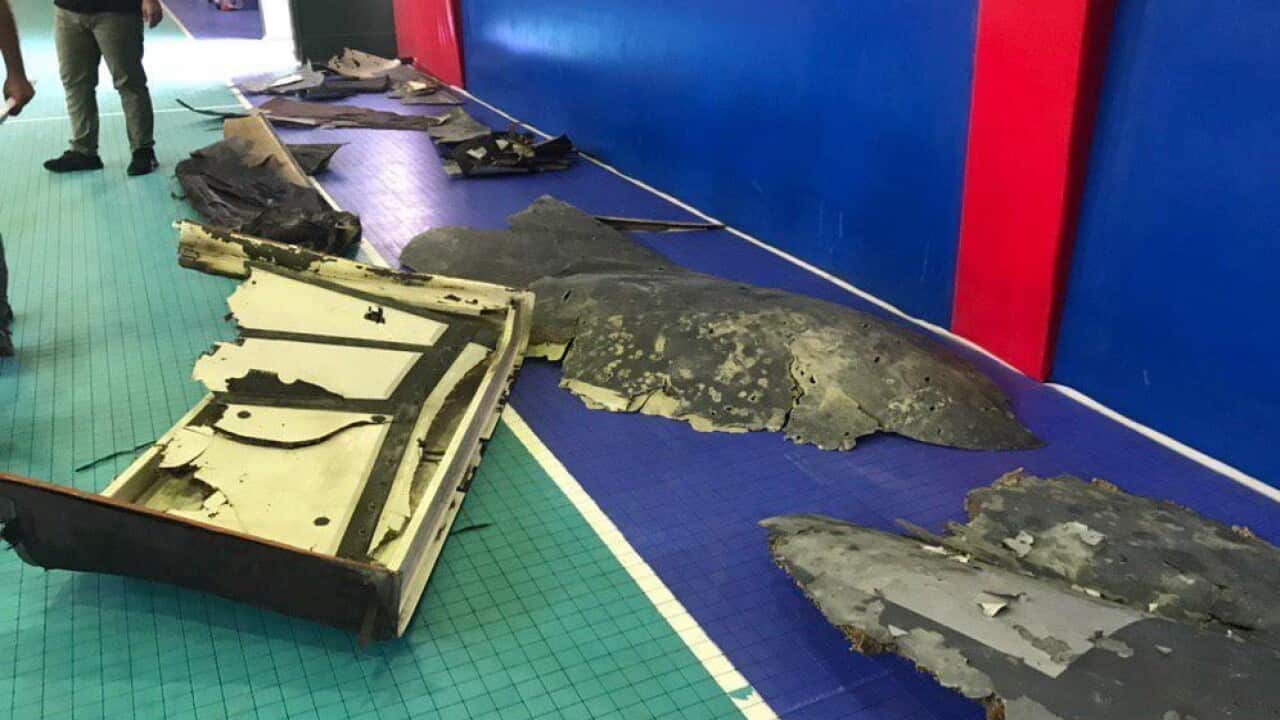 A handout photo made available by Iran's state TV official website shows the alleged wreckage of US drone RQ-4A.