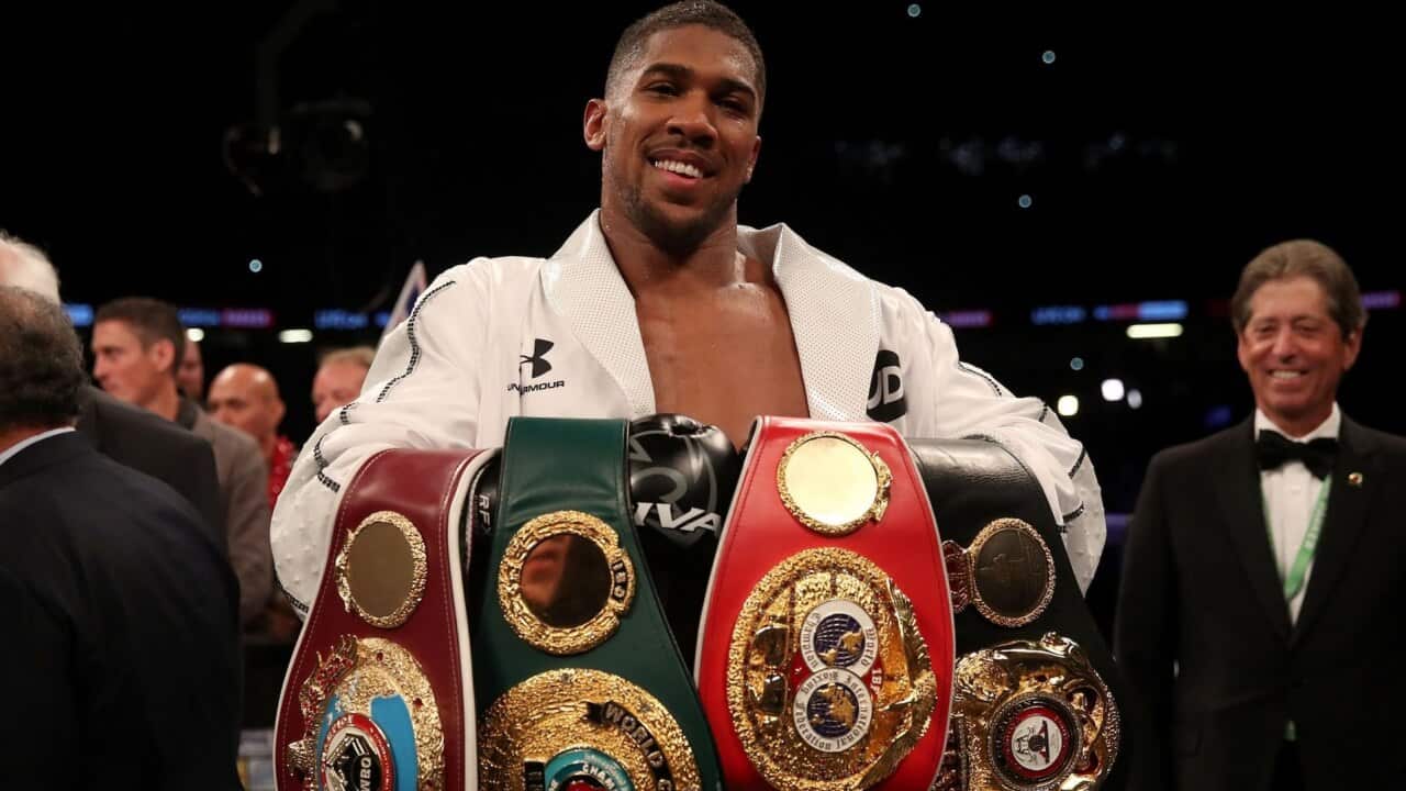 Anthony Joshua defeats Joseph Parker on points to win fourth world title