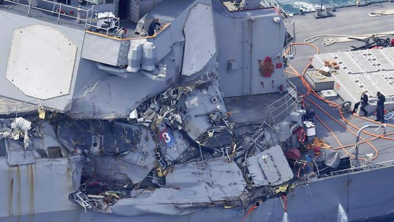 An aerial photo shows the USS Fitzgerald that is damaged by the collision with the Philippine cargo ship at off the coast of Izuoshima on June 17, 2017. According to JCG, seven U.S. crew members are missing. ( The Yomiuri Shimbun via AP Images )