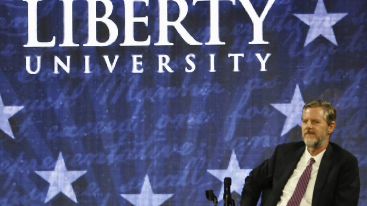 Liberty University President Jerry Falwell, Jr. listens