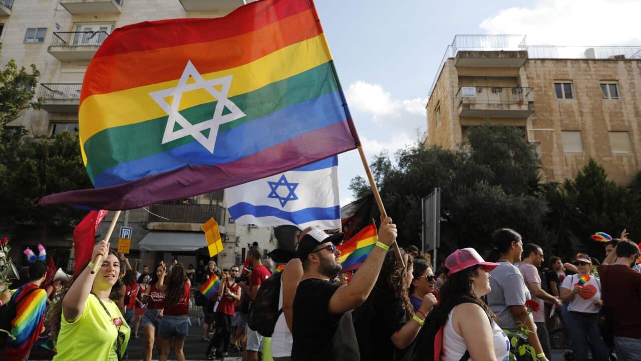People march during the annual Gay Pride parade in Jerusalem, Israel, 02 August 2018