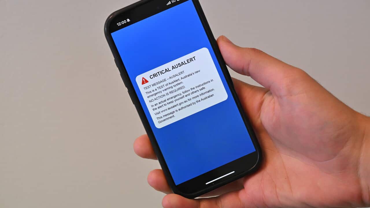 A phone screen with an example of the AusAlert emergency alert test.