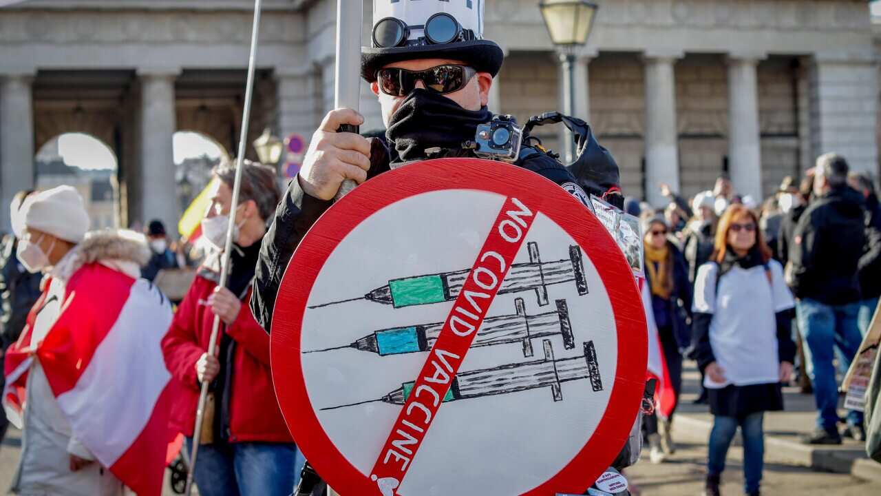 A man takes part in a demonstration against the country's coronavirus restrictions in Vienna