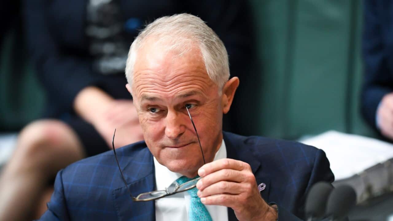 Australian Prime Minister Malcolm Turnbull reacts during House of Representatives Question Time at Parliament House in Canberra, Monday, March 26, 2018.