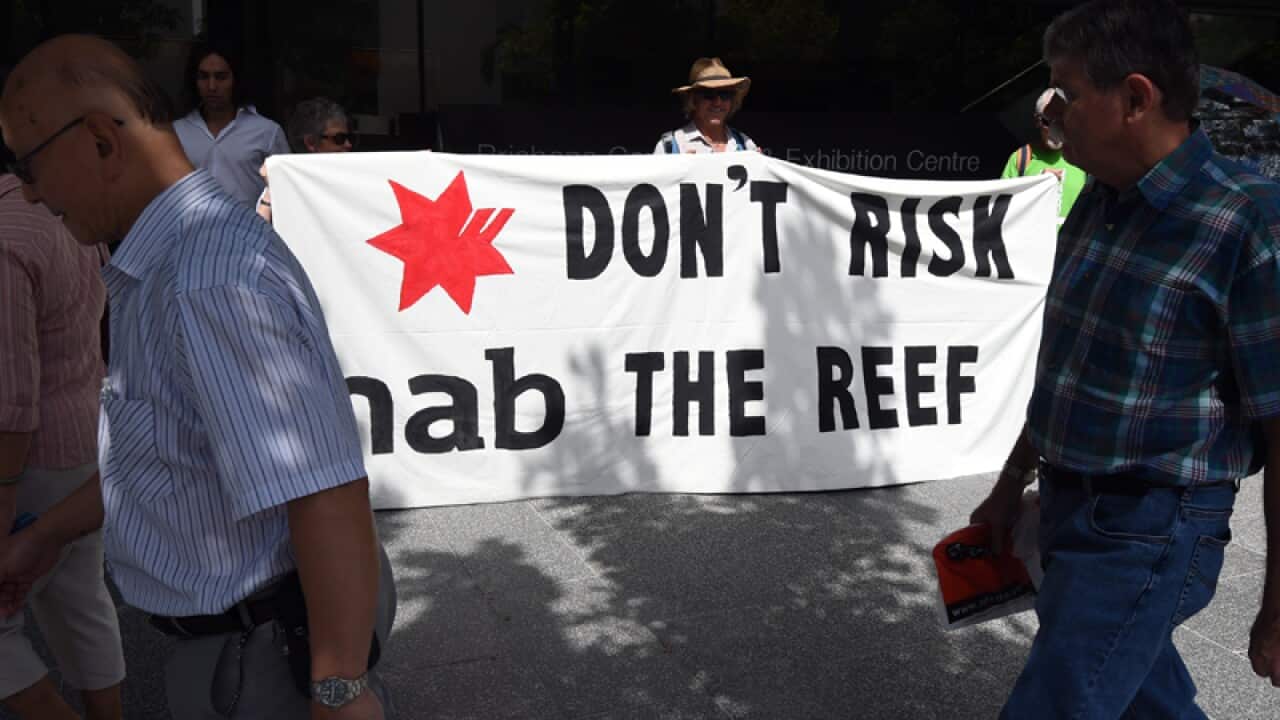 Environmental protesters outside the NAB AGM in Brisbane
