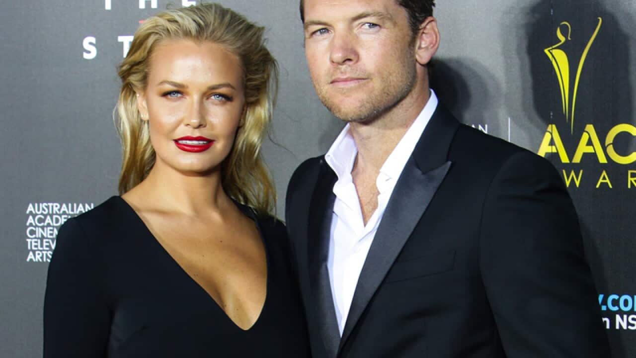 Lara Bingle (L) and Sam Worthington