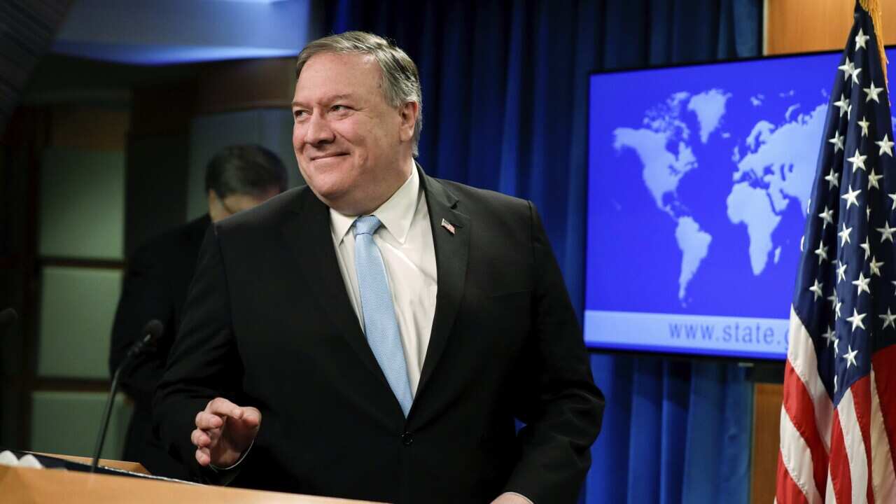 U.S. Secretary of State Mike Pompeo arrives to lead a joint briefing about an executive order from President Donald Trump on the International Criminal Court