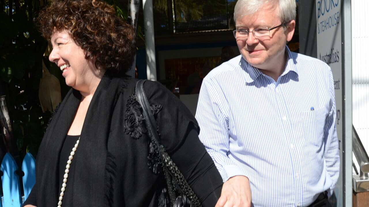 Rudd boards flight from Brisbane