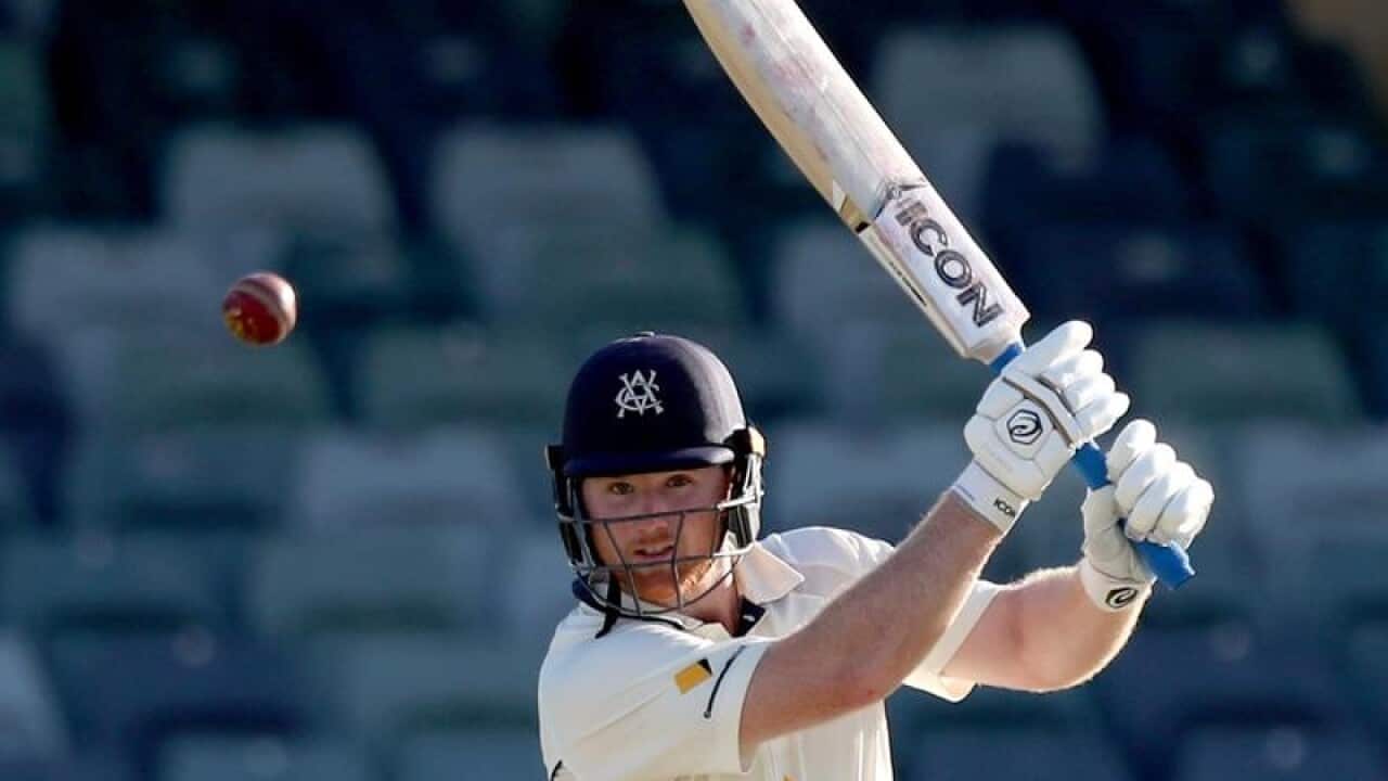 Travis Dean of Victoria plays a shot during a match at the WACA.