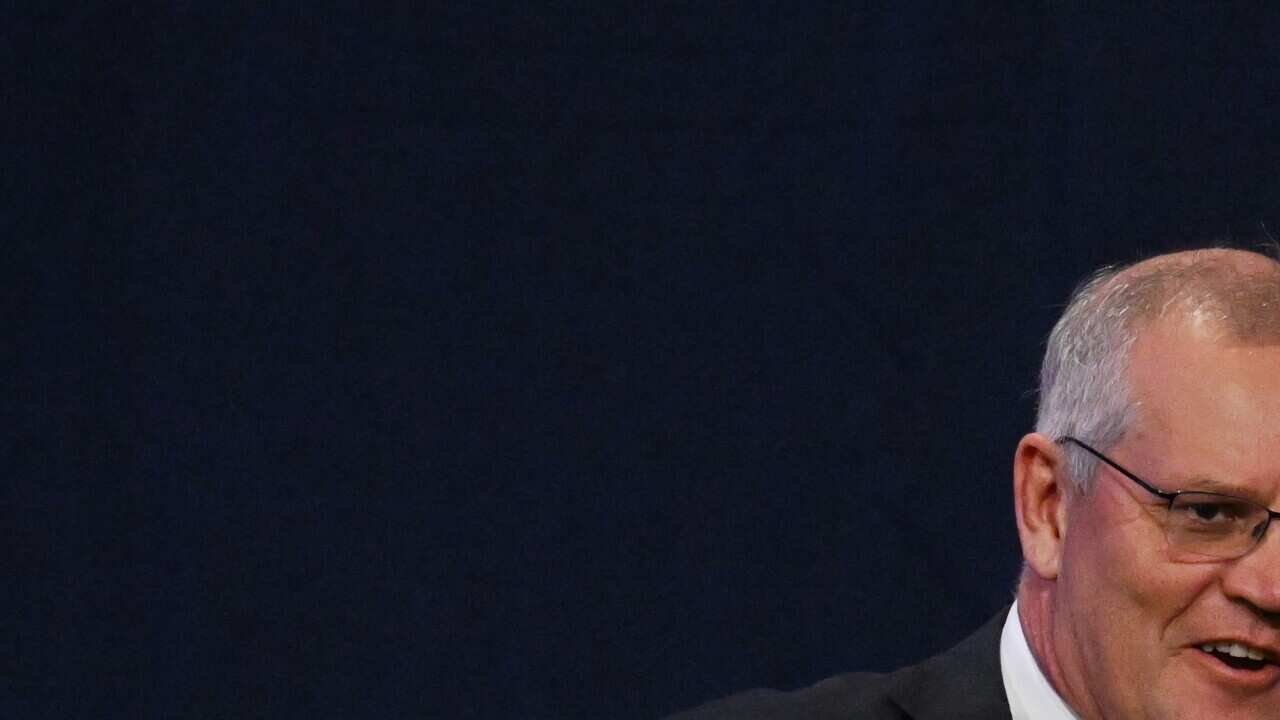 Scott Morrison arrives to concede defeat at the Federal Liberal Reception during the at The Fullerton Hotel 2022 Federal Election, Sydney, Saturday, May 21, 2022. More than 17 million Australians have voted to elect the next federal government. (AAP Image