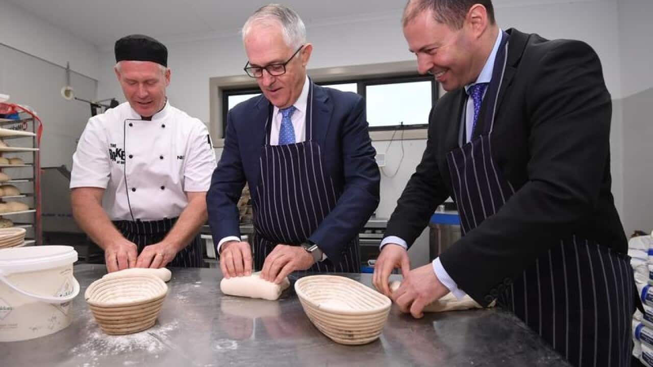 Malcolm Turnbull and Josh Frydenberg during a visit to a bakery