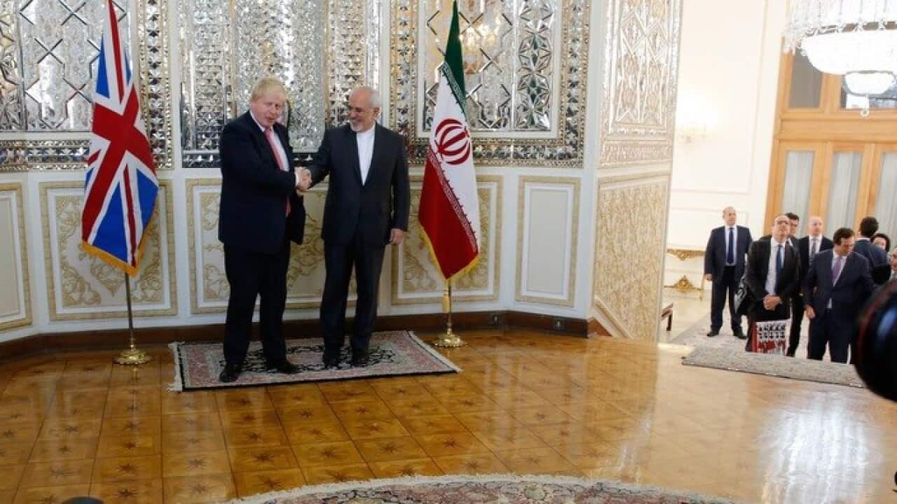 Iranian Foreign Minister Mohammad Javad Zarif (R) with Boris Johnson in Tehran, Iran in 2017