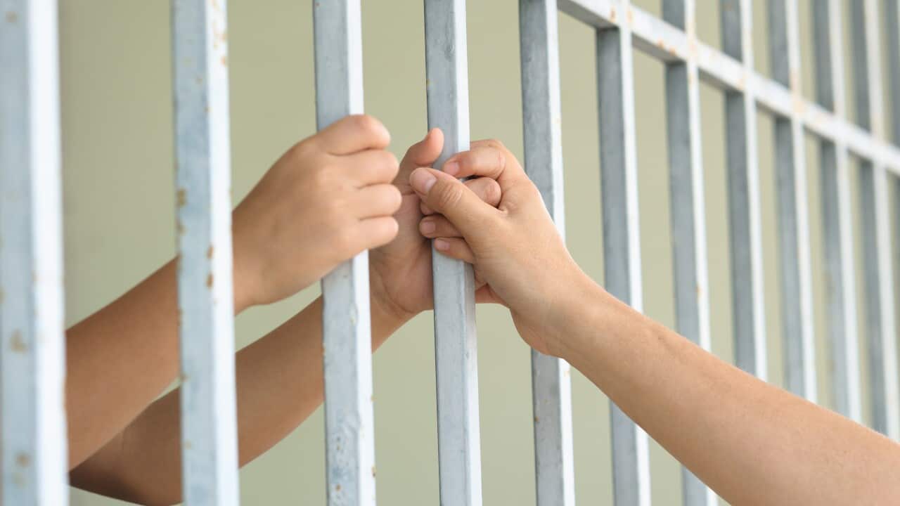 Mom holding kid hand