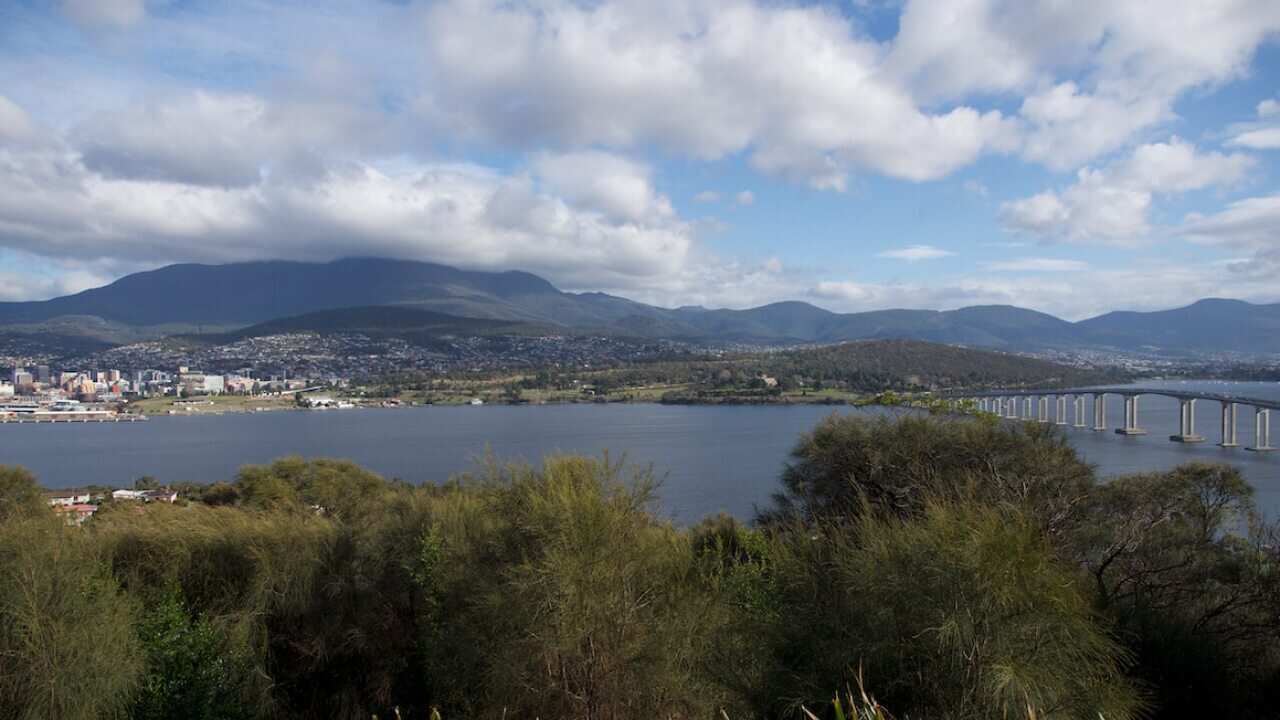 Hobart to the left in the foothills of kunanyi/Mount Wellington.
