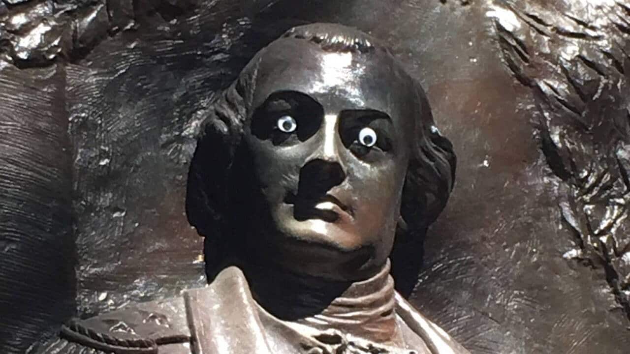 The statue of Nathanael Greene defaced with 'googly eyes'.