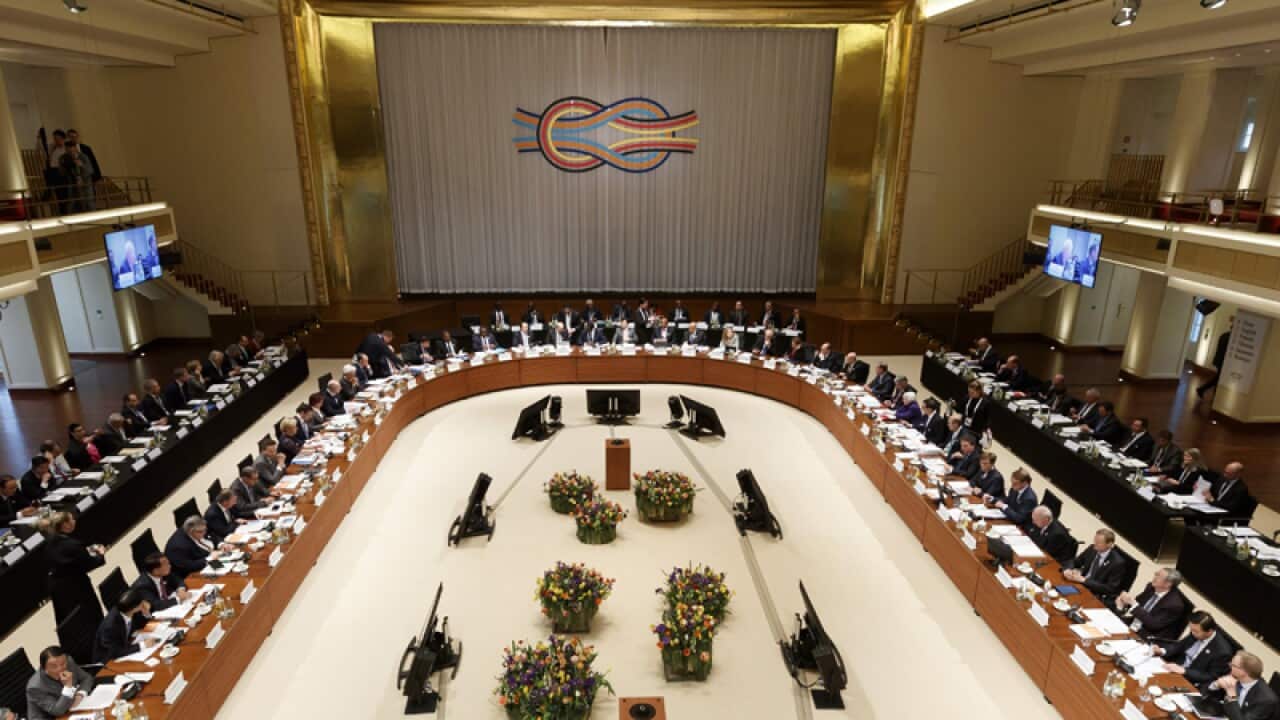 Members of G20 sitting in the Convention Center