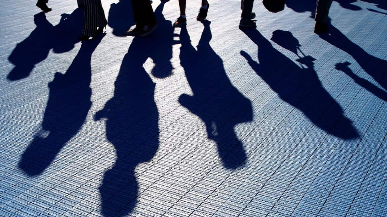 A crowd of people on the move (Getty)