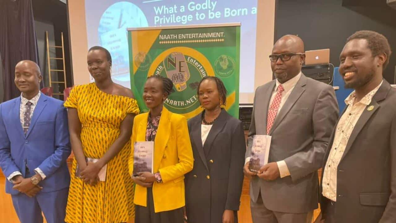 Tabitha Nyaziel with the members of the community