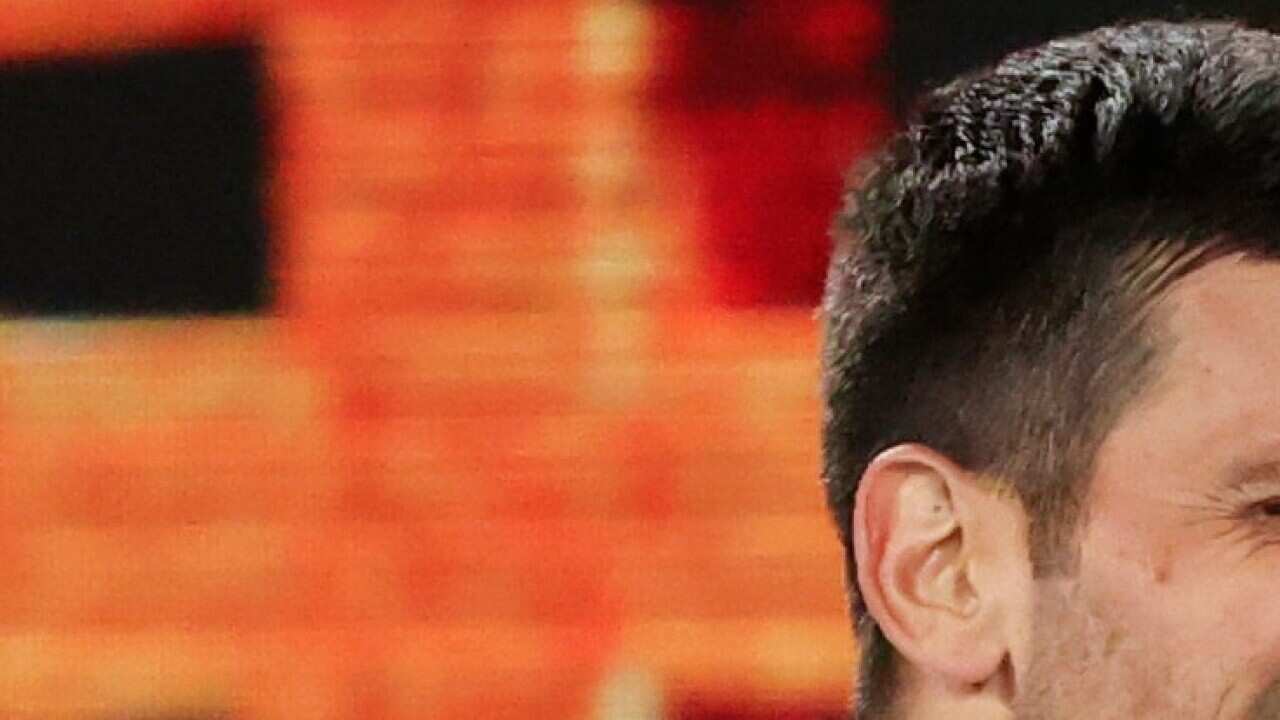 Serbia's Novak Djokovic celebrates after defeating Canada's Milos Raonic during their fourth round match at the Australian Open tennis championship in Melbourne, Australia, Monday, Feb. 15, 2021. AAP Image/AP Photo/Hamish Blair