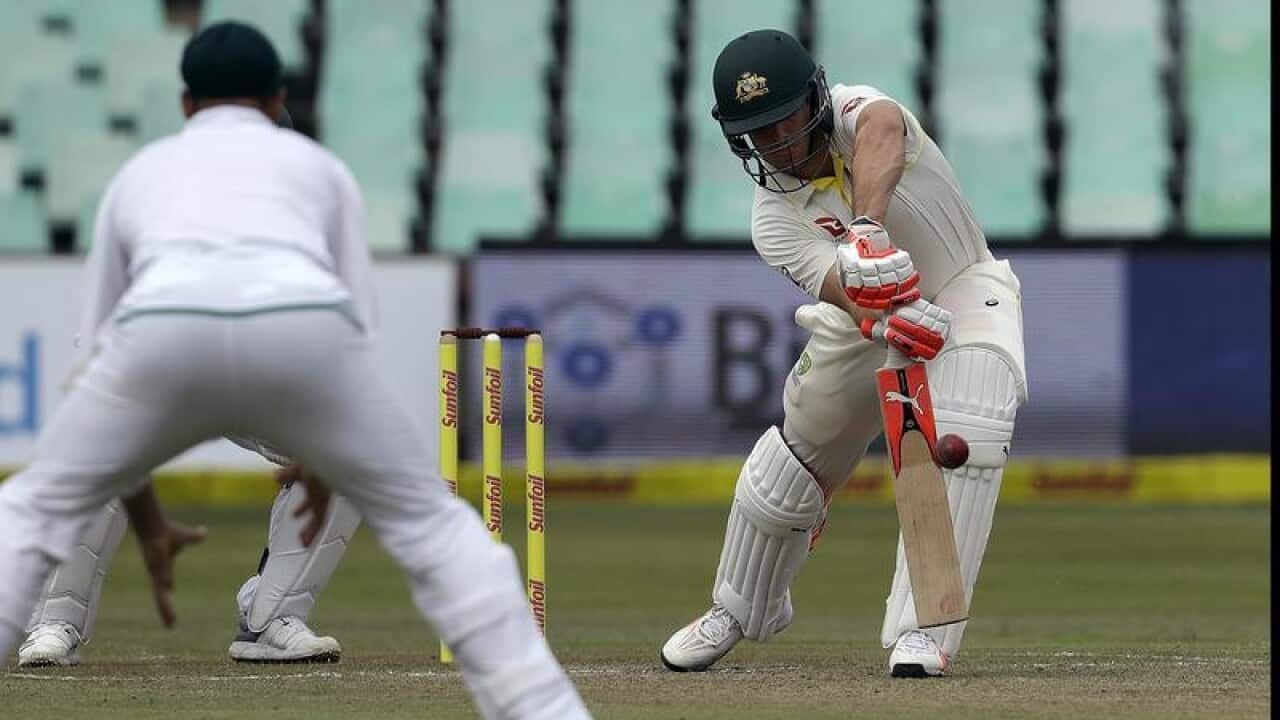 Mitchell Marsh, right, plays a delivery.
