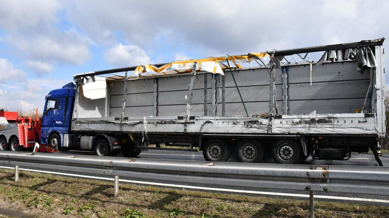 A freight truck with Serbian license plates overturned early on Monday on a highway killing four migrants who were hiding inside, and injuring a number of others, in Okucani, Croatia, on March 22, 2021.
