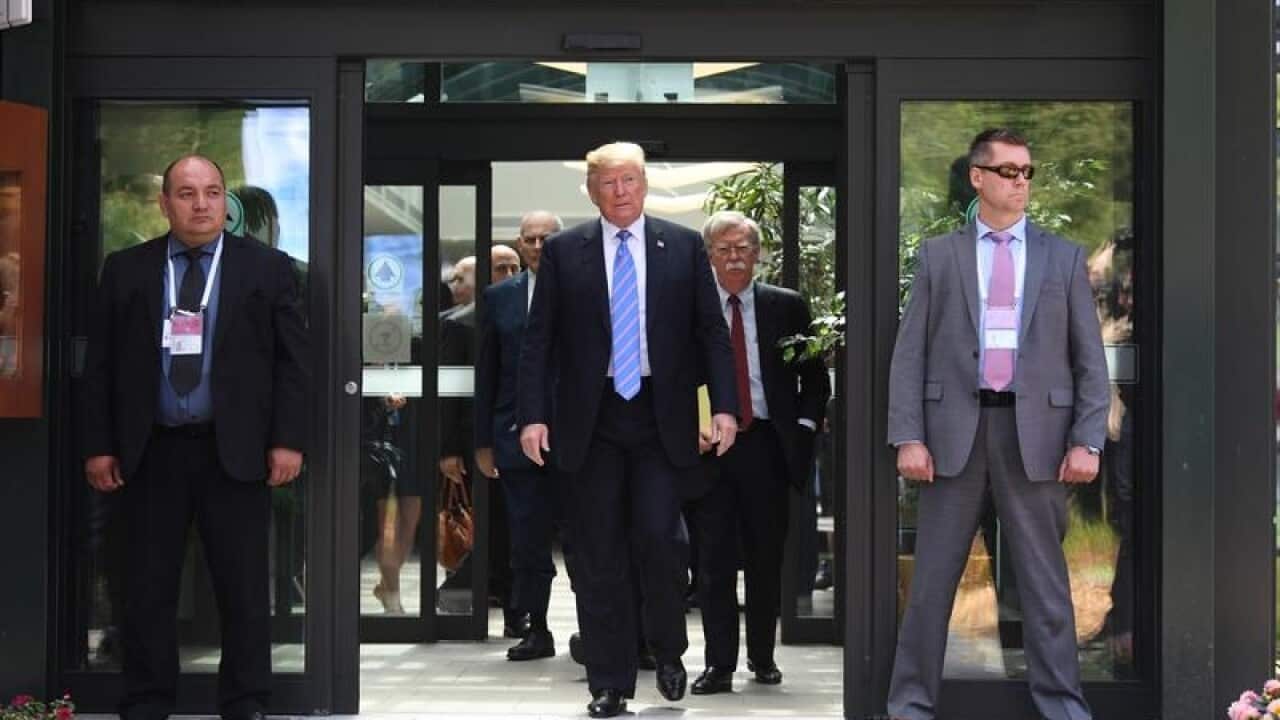 US President Donald Trump leaves the G7 summit in Canada