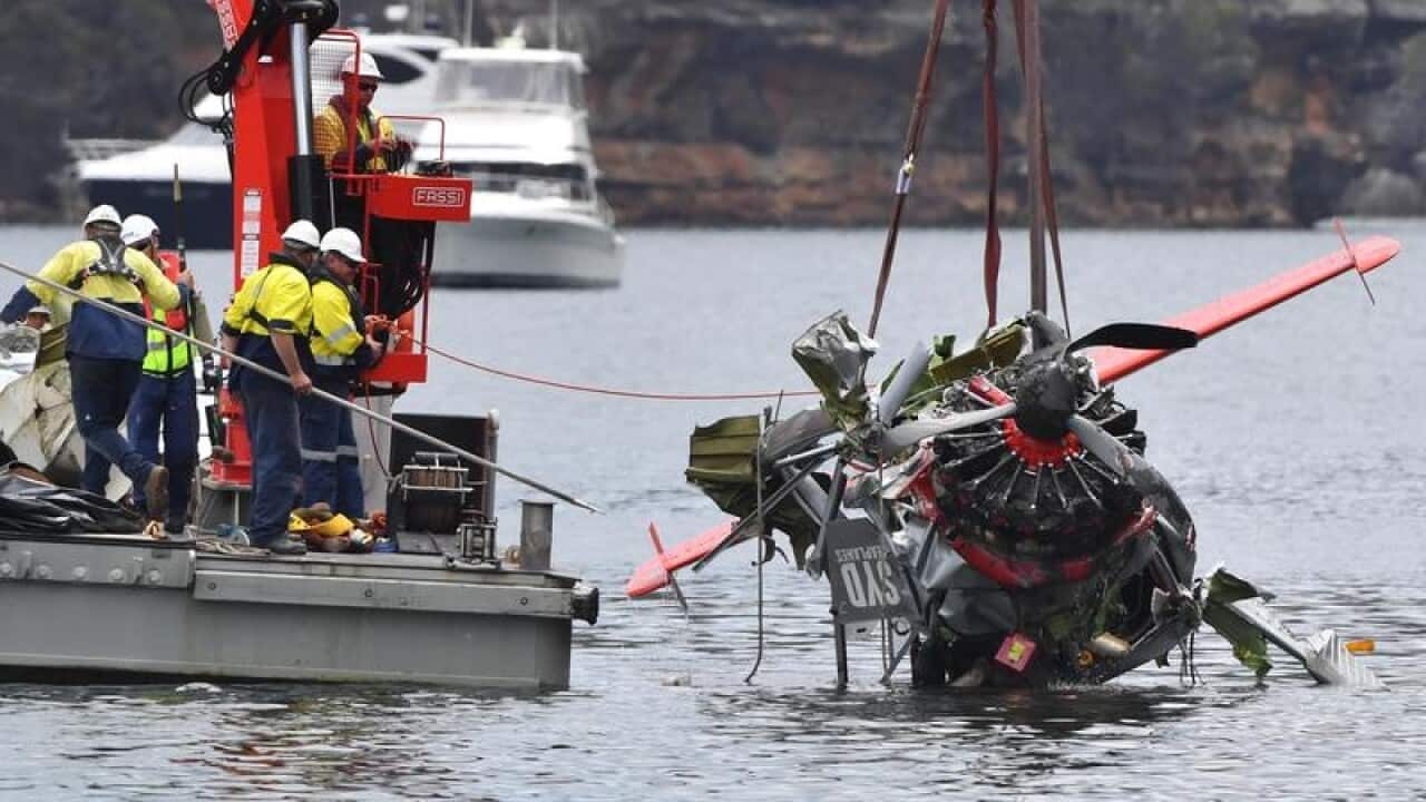 Investigators are still don't know why a seaplane crashed in a narrow bay, killing all six on board.