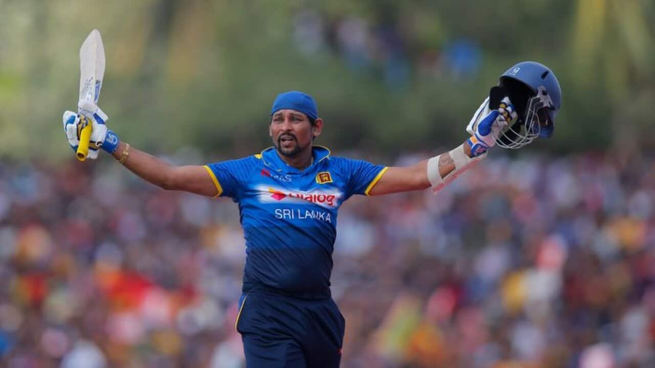 Sri Lanka's Tillakaratne Dilshan acknowledges the crowd as he leaves the pitch after playing his final innings of his one day international