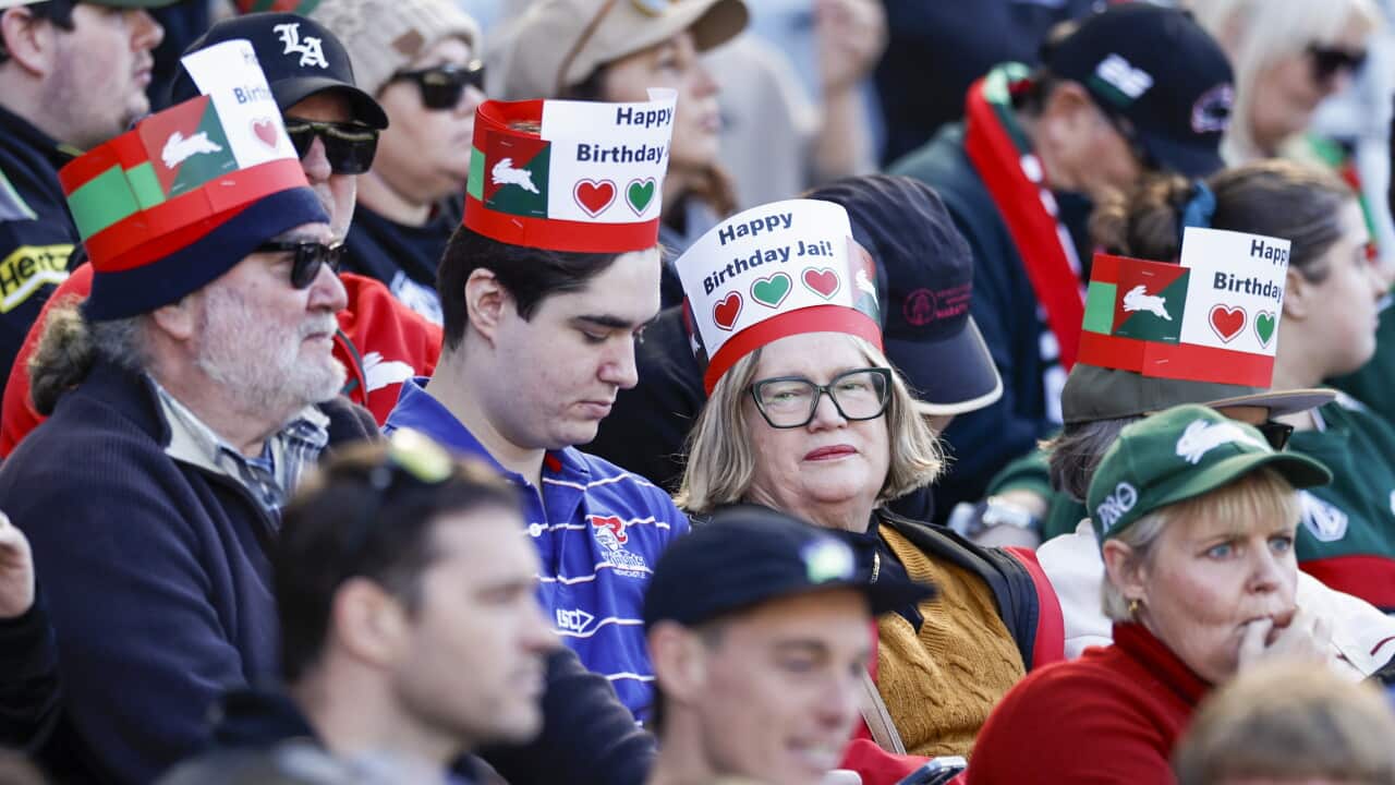 People wear a birthday hat as part of the Jai Arrow's Birthday Bash, a fundraiser for motor neurone disease (AAP)