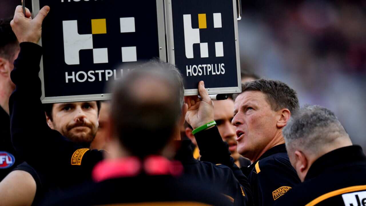 Richmond coach Damien Hardwick speaks to his players