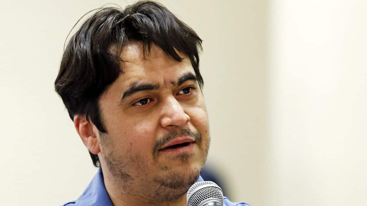 Ruhollah Zam speaks during his trial at Iran's Revolutionary Court in Tehran on June 2, 2020.