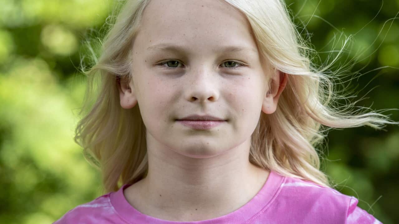 Becky Pepper-Jackson standing outside and looking at the camera.