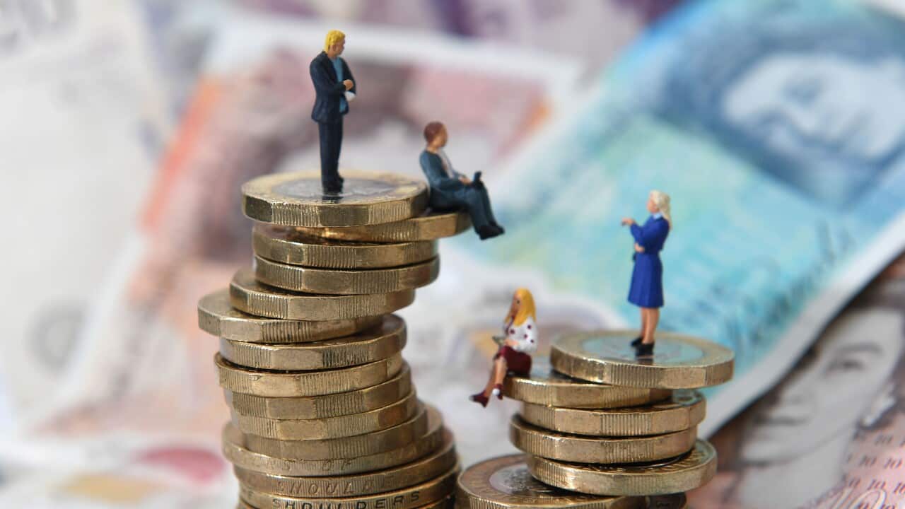File photo dated 12/09/18 of figures on coins and bank notes. The gender pay gap for full-time workers has fallen to a record low of 8.6\%,