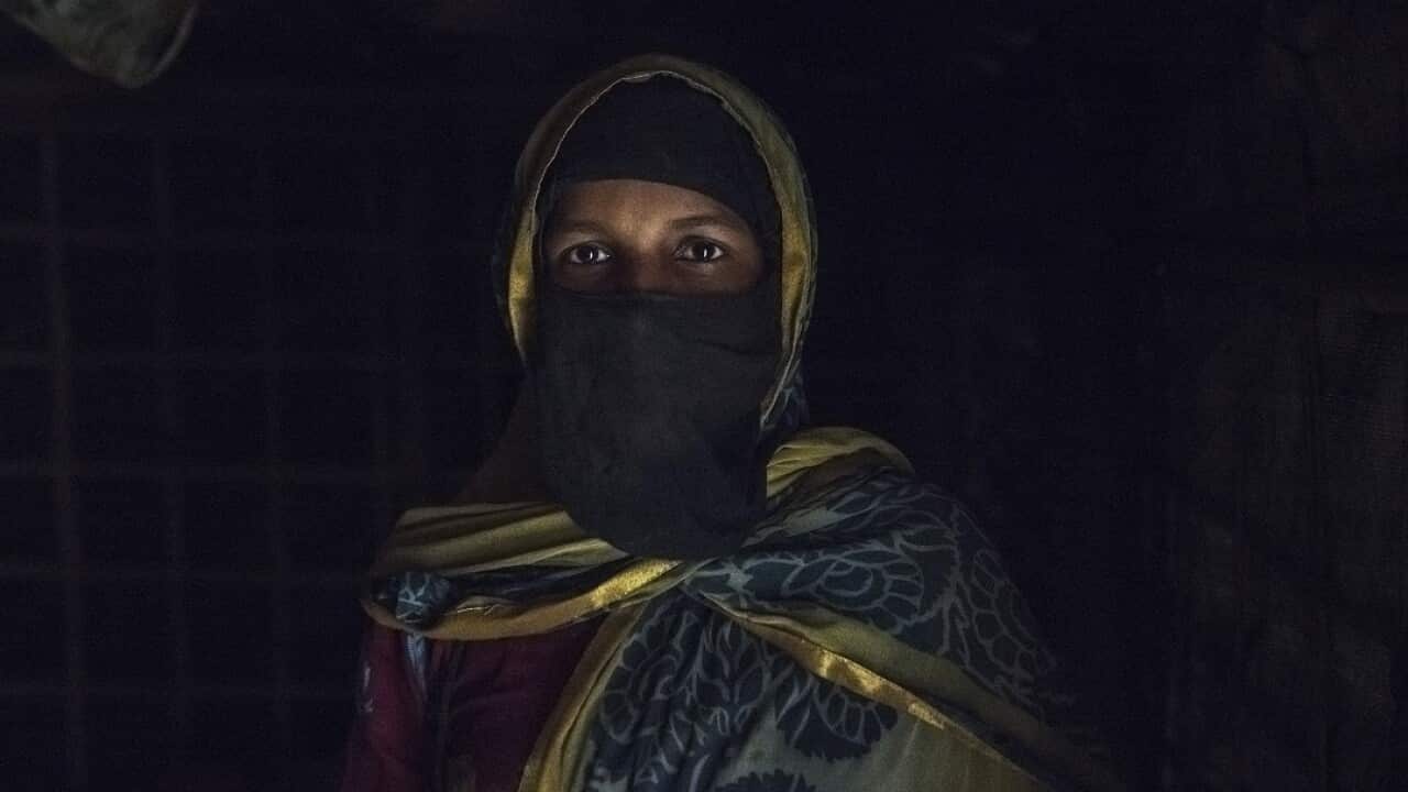 Noor, a Rohingya refugee who is nine months pregnant and was gang-raped by soldiers in Myanmar, at her home in the Kutupalong refugee camp in Bangladesh.