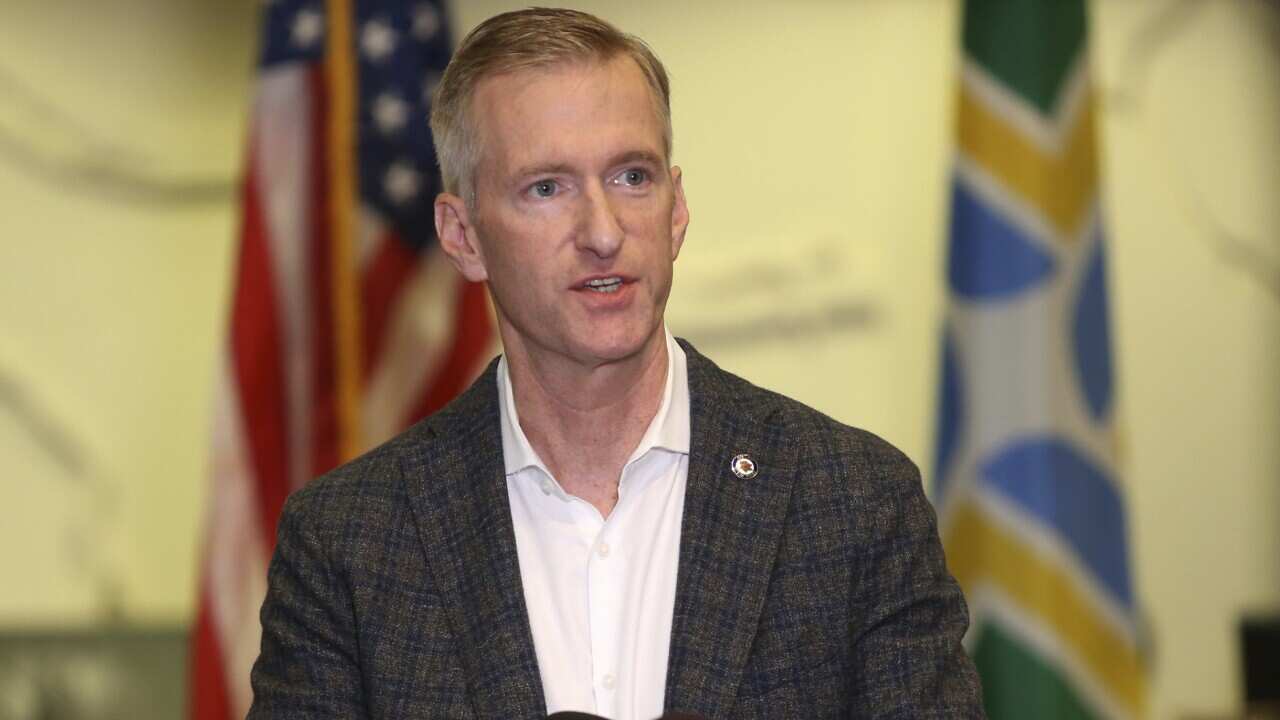 Portland Mayor Ted Wheeler calls for an end to violence in the city during a news conference Sunday, Aug. 30, 2020, a day after a demonstrator was shot and killed in downtown Portland on Saturday. (Sean Meagher/The Oregonian via AP)