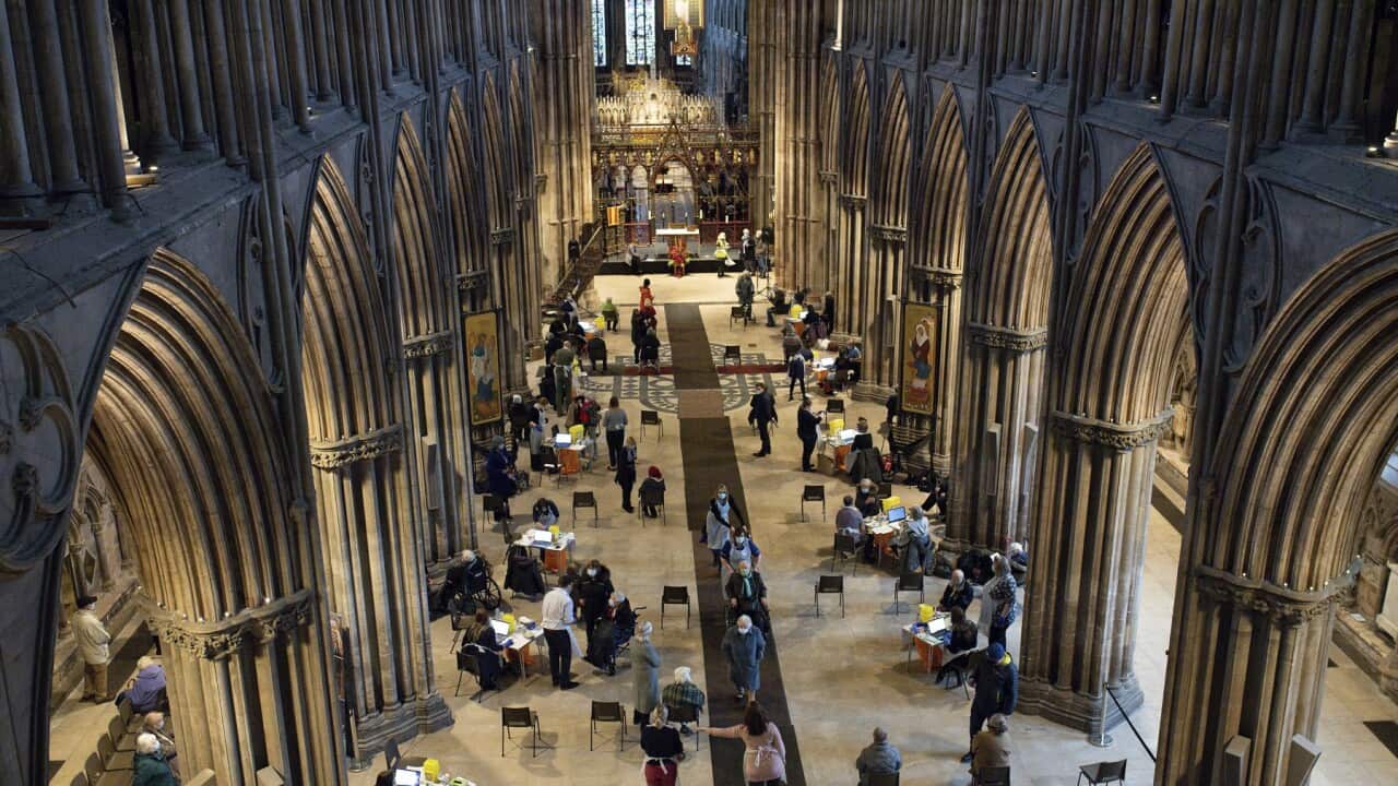 Members of the public receive the AstraZeneca coronavirus vaccine at Lichfield Cathedral