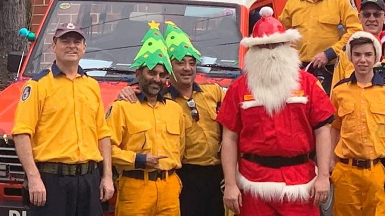 Ranjith with fellow volunteer firefighters celebrating Christmas, 2019