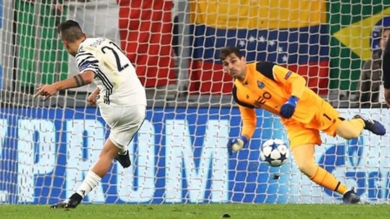 Juve through after penalty, red card end Porto hopes