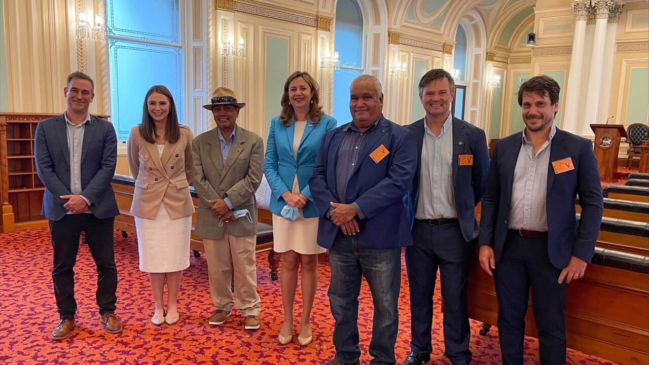 Group photo of Balkanu land hand back event