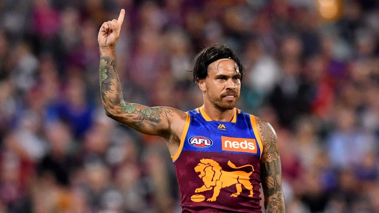 Allen Christensen of the Lions celebrates kicking a goal during the Round 5 AFL match between the Brisbane Lions and the Collingwood Magpies at the Gabba in Brisbane, Thursday, April 18, 2019. (AAP Image/Darren England) NO ARCHIVING, EDITORIAL USE ONLY