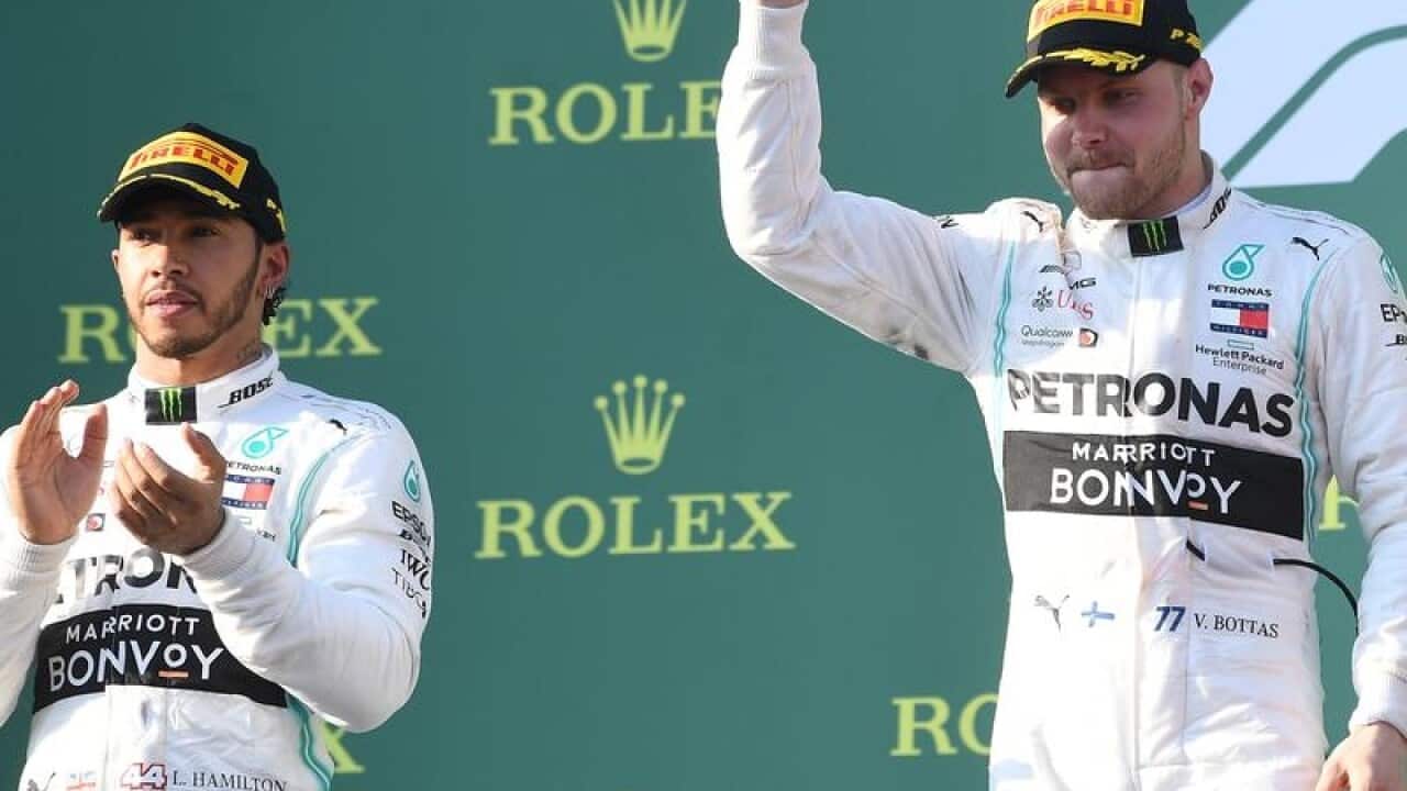 Lewis Hamilton (L) and Valterri Bottas
