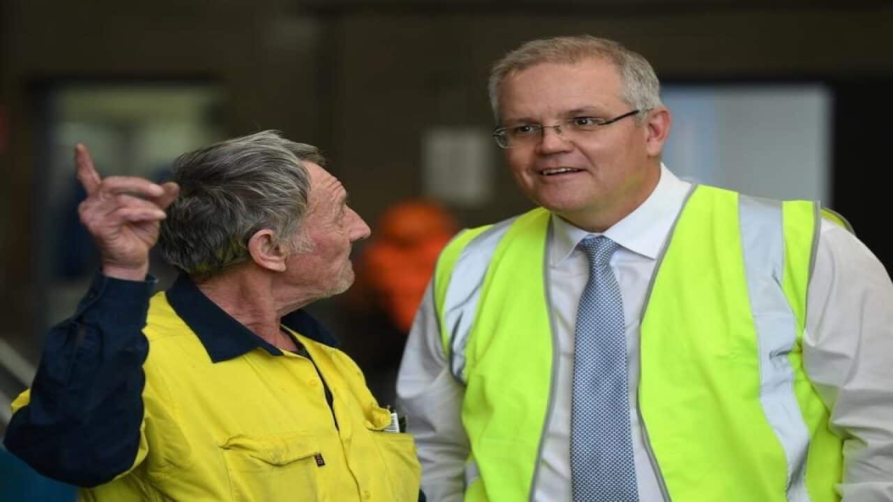 Scott Morrison with a worker at a Sydney factory.
